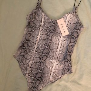 Grey Snake print onesie.